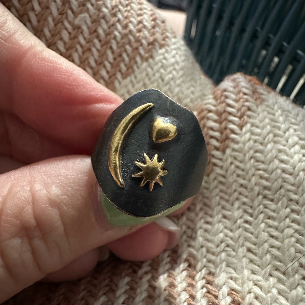 Waxing Poetic ring.